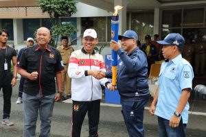 Pemkab HSS Serahkan Api Obor Porprov XII Kalsel Kab.Tanah Laut WhatsApp Image 2025-10-27 at 12.39.44 (2)