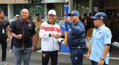 Pemkab HSS Serahkan Api Obor Porprov XII Kalsel Kab.Tanah Laut